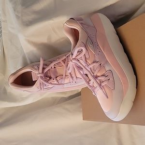 New in the box, Ugg Sneakers, size 9, in shades of pink n white.